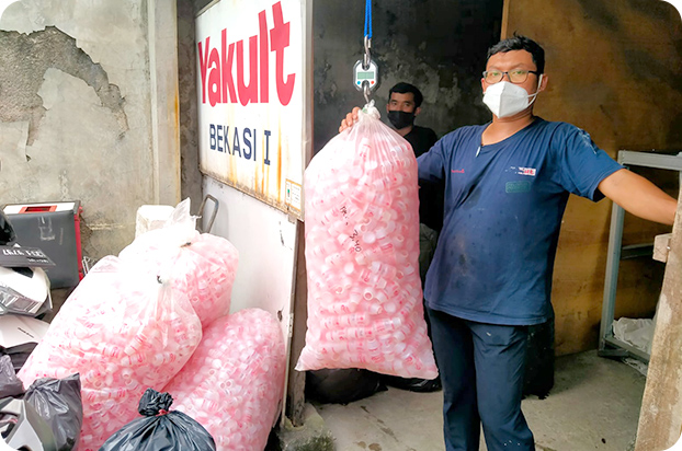 Collecting Yakult containers